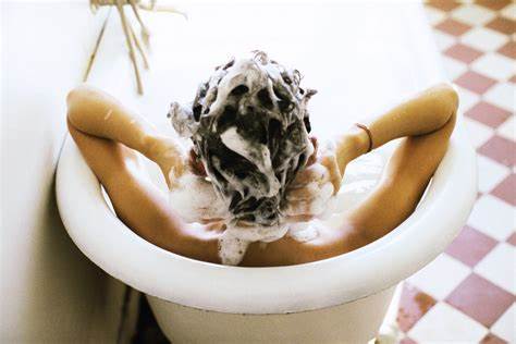 What is the purpose of using a scalp cleansing shampoo?